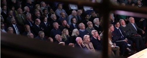 Hollyport Capital AGM audience — film still from Wink video work